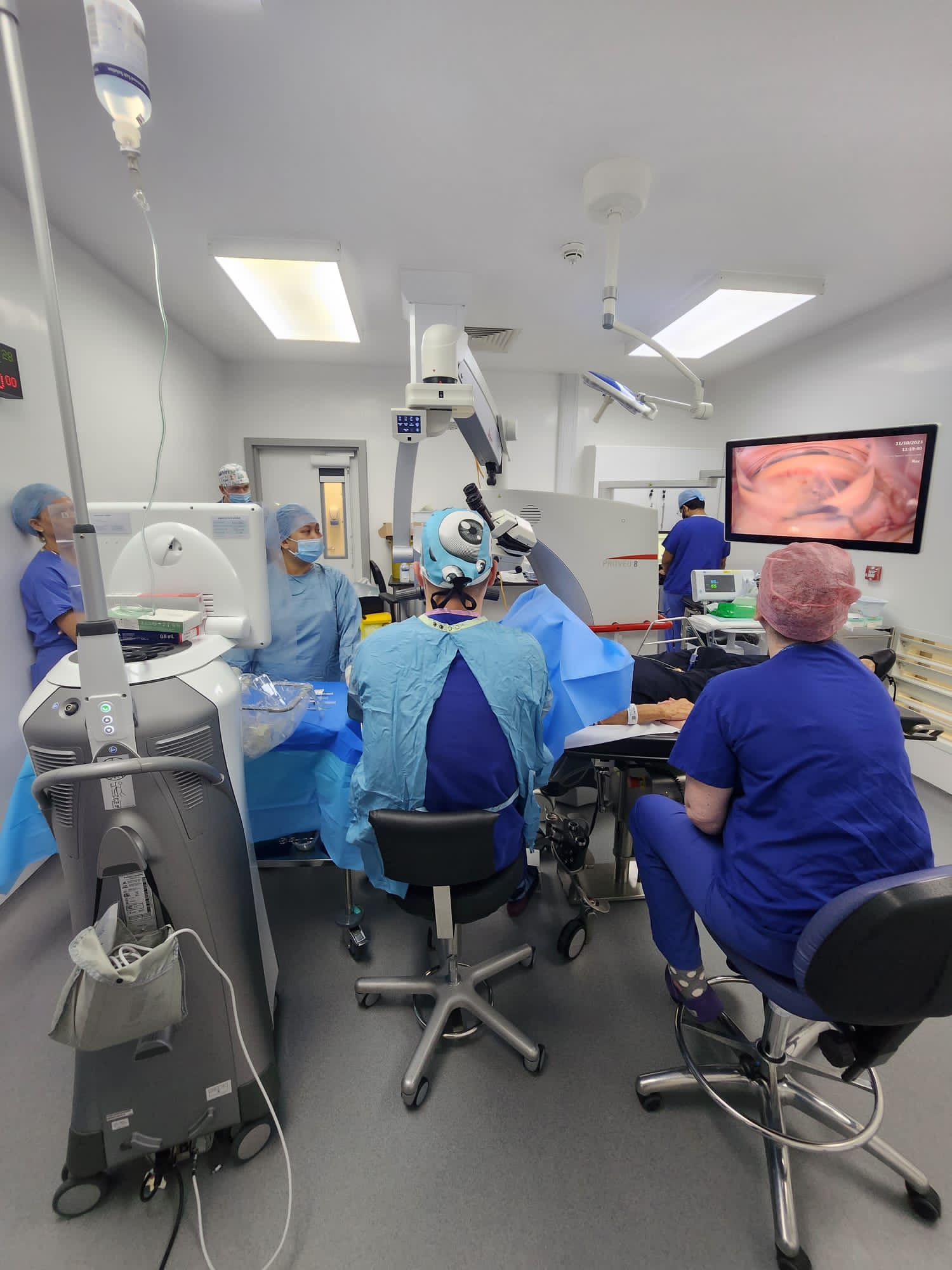 Dr. Dervenis at the surgical microscope